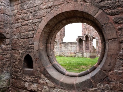 Round window opening at the ruins of the monastery church, former Cistercian nunnery, Stadtroda,