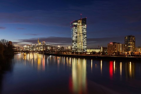 The lights in the offices of the European Central Bank (ECB) and in the skyscrapers of Frankfurt's