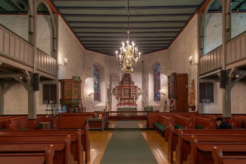 Interior of a church with chandeliers, wooden benches and wooden altar, Skedsmo Pilgrim Church,