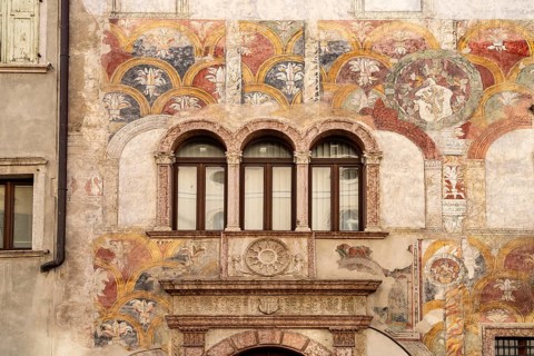 The painted façade of the Palazzo Quetta - Alberti Colico palace in Trento, Trentino, Italy, Europe