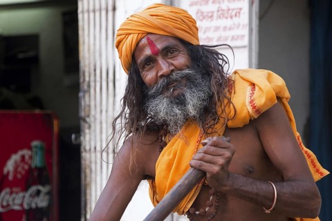 Close-up portrait of Hindu man wearing red bindi on forehead in Udaipur, Rajasthan, India, Asia