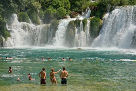 Tourists taking a bath at the Skradinski buk waterfalls, Krka National Park, Šibenik-Knin County,