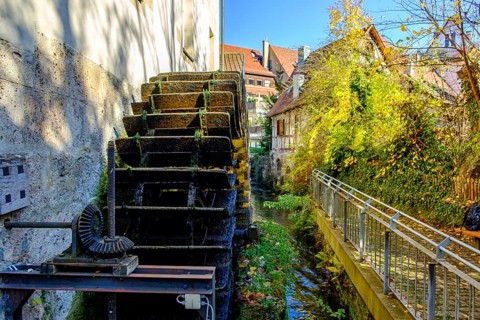 Historical mill wheel at the Klostermühle town museum, Bad Urach, Swabian Alb, Baden-Württemberg,