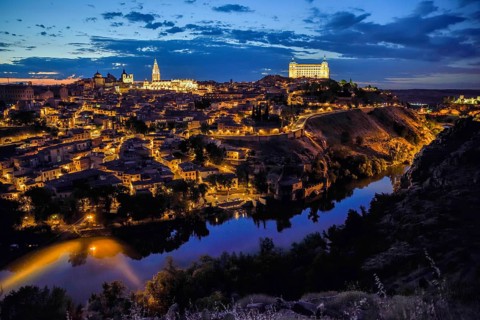 City view of Toledo with the river Tajo, blue hour, province Toledo, region Castilla-La Mancha,