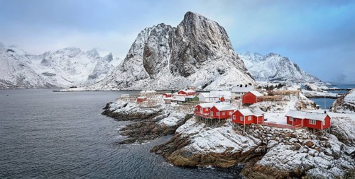 Panorama of famous tourist attraction Hamnoy fishing village on Lofoten Islands, Norway with red
