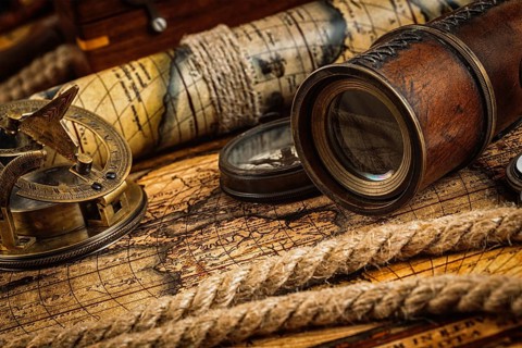 Travel geography navigation concept background, old vintage retro compass with sundial, spyglass