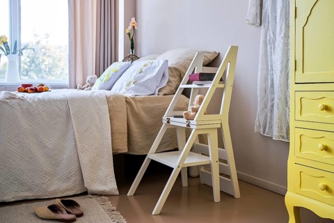 Use of folding stepladder chair in bedroom