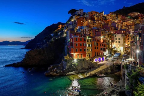 Fishing village of Riomaggiore, blue hour, Cinque Terre, province of La Spezia, Liguria, Italy,