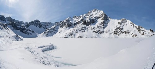 Frozen reservoir, Finstertal reservoir, with Zwölferkogel peak, Kühtai, Stubai Alps, Tyrol,