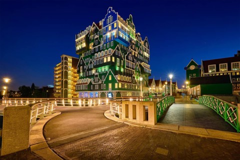 ZAANDAM, NETHERLANDS, MAY 8, 2017: Inntel Hotel in Zaandam illuminated at night. Design of