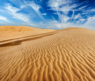 Desert sand dunes on sunrise, Mui Ne, Vietnam, Asia