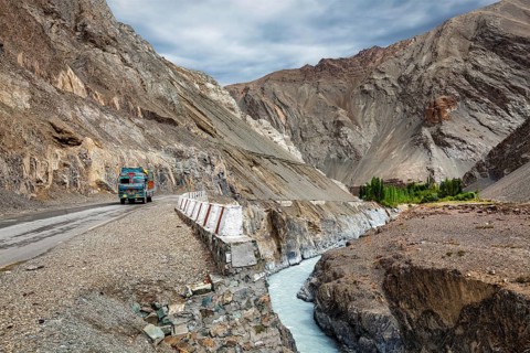 Indian lorry truck on NH-1 (Srinagar Leh national highway) in Himalayas. Ladakh, India, Asia