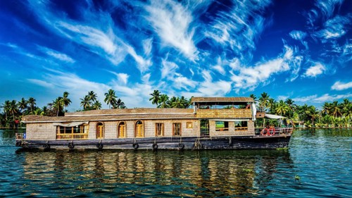 Kerala India travel background, panorama of tourist houseboat on Kerala backwaters. Kerala, India,