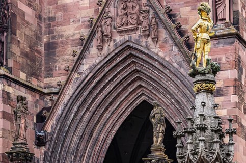 Knightly figure of St. George and details on the main portal of the Cathedral of Our Lady, Freiburg