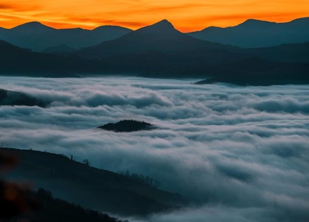 About to rise in the sun Dawn cloudy one morning in the valley of Lesaka, Navarra. Basque Country