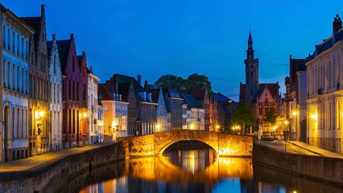 Panorama of Bruges (Brugge) canal in the evening twilight, Belgium, Europe