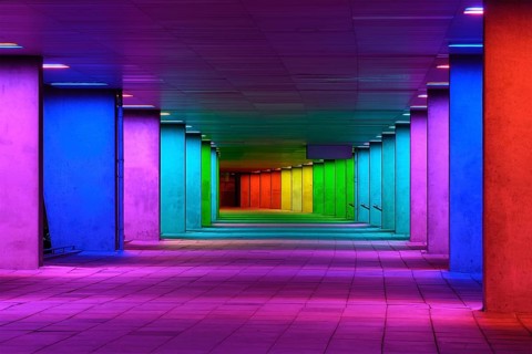 Colorful mulitcolord illuminated gallery tunnel rainbow passage under NAI building, Nederlands
