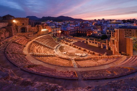 Teatro Romano, blue hour, Roman amphitheater, in the old town of Cartagena, Murcia region, Spain,