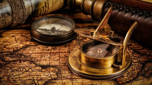 Travel geography navigation concept background, panorama of old vintage retro compass with sundial,