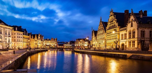 Panorama of Ghent canal, Graslei and Korenlei streets in twlight the evening. Ghent, Belgium,