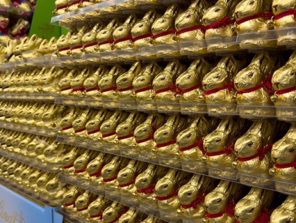 Display on retail shelf wholesale of large quantity of chocolate Easter bunnies chocolate Easter