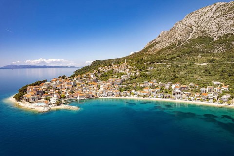 City view and beach of Igrane seen from the air, Croatia, Europe