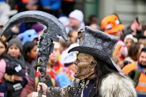 Person dressed up as a goth at the Wey guild on Rose Monday, Güdismäntig, Lucerne Carnival 2024,