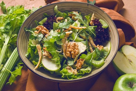 Fresh, Waldorf salad, celery stalk with chicken, apple and walnut, grapes, herbs, homemade, no