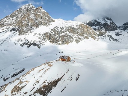 Aerial view, Piz Picuogl, winter in the mountains, Chamanna Jenatsch CAS, Swiss Alpine Club hut,