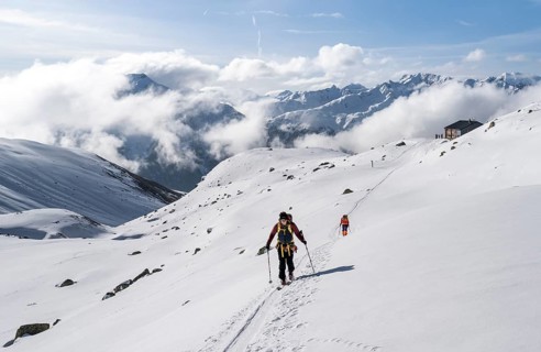 Ski tourers in a wintry mountain landscape, Bündner Haute Route ski tour, Albula Alps, Rhaetian