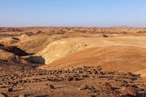 View over the lunar landscape near Swakopmund in the evening light, Namibia, Africa