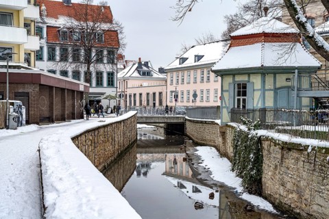 On the snow-covered Leine Canal in Göttingen, Lower Saxony, Germany, Europe