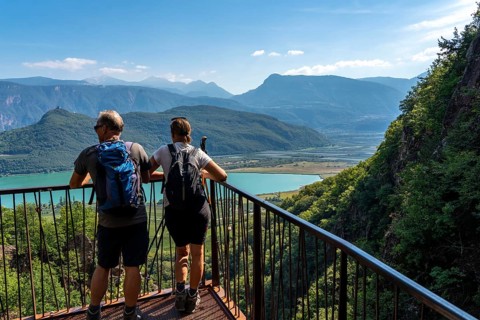 View from the hiking trail of the Rastenbach gorge to Lake Kaltern, near the village of Kaltern, in