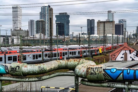 Mainova district heating line, local trains on the track in front of Frankfurt am Main main