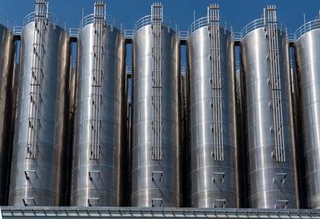 Stainless steel tanks of a large silo facility in Duisburg inland harbour, Duisburg-Neuenkamp, for