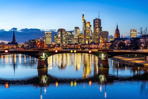 Skyline of the city centre of Frankfurt am Main, river Main, dusk, Ignatz-Bubis-Brücke, Hesse,