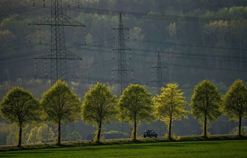 Traffic on the B59 motorway near Grevenbroich, avenue, high-voltage pylons, Germany, Europe