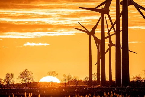 Wind farm near the East Frisian town of Norden, east of the town, sunset, Lower Saxony, Germany,