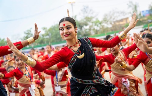 Participants with an instructor dance on the final day of a Bihu dance workshop ahead of Rongali