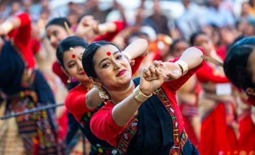 Participants with instructors dance on the final day of a Bihu dance workshop ahead of Rongali Bihu