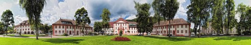 St Blasien Panorama in the spa garden with town hall Haus des Gastes and cathedral Germany