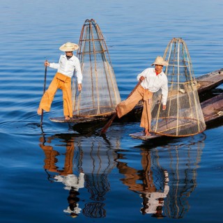 Myanmar travel attraction landmark, Traditional Burmese fishermen with fishing net at Inle lake in