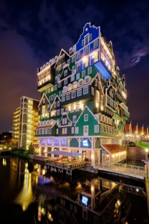 ZAANDAM, NETHERLANDS, MAY 21, 2018: Inntel Hotel in Zaandam illuminated at night. Design of