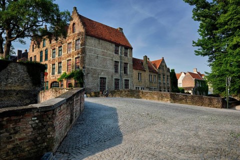 Bruges typical Belgian cityscape Europe tourism concept, canal and old houses and bridge. Brugge,