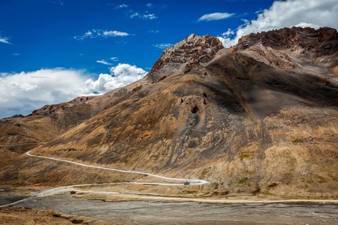 Winding mountain road Manali-Leh to Ladakh with bus in Indian Himalayas. Ladakh, India, Asia