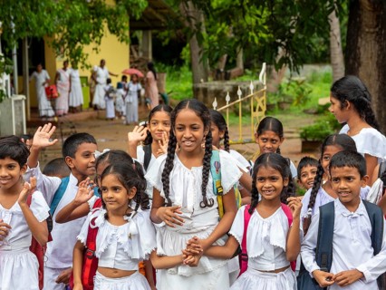 Group of school children, girls and boys in white school clothes, Dambulla, Sri Lanka, Asia