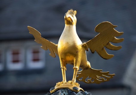 Gilded imperial eagle as a fountain eagle on the market fountain, Old Town, Goslar, UNESCO World
