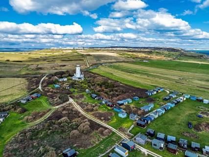 Portland Bird Observatory from a drone, Bill Lighthouse, Portland Bill, Isle of Portland, Dorset,