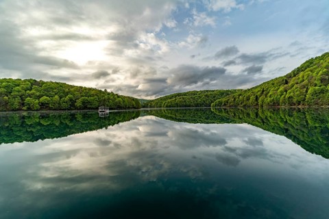 Electric tourist boat on the largest lake Kozjak in Plitvice Lakes National Park, Croatia, Europe