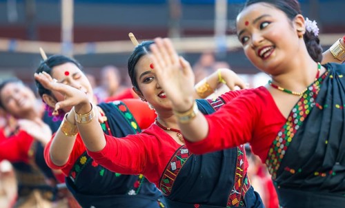 Participants with instructors dance on the final day of a Bihu dance workshop ahead of Rongali Bihu